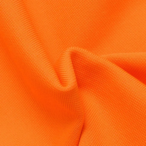 Collage of orange fabric showing texture and color variations.