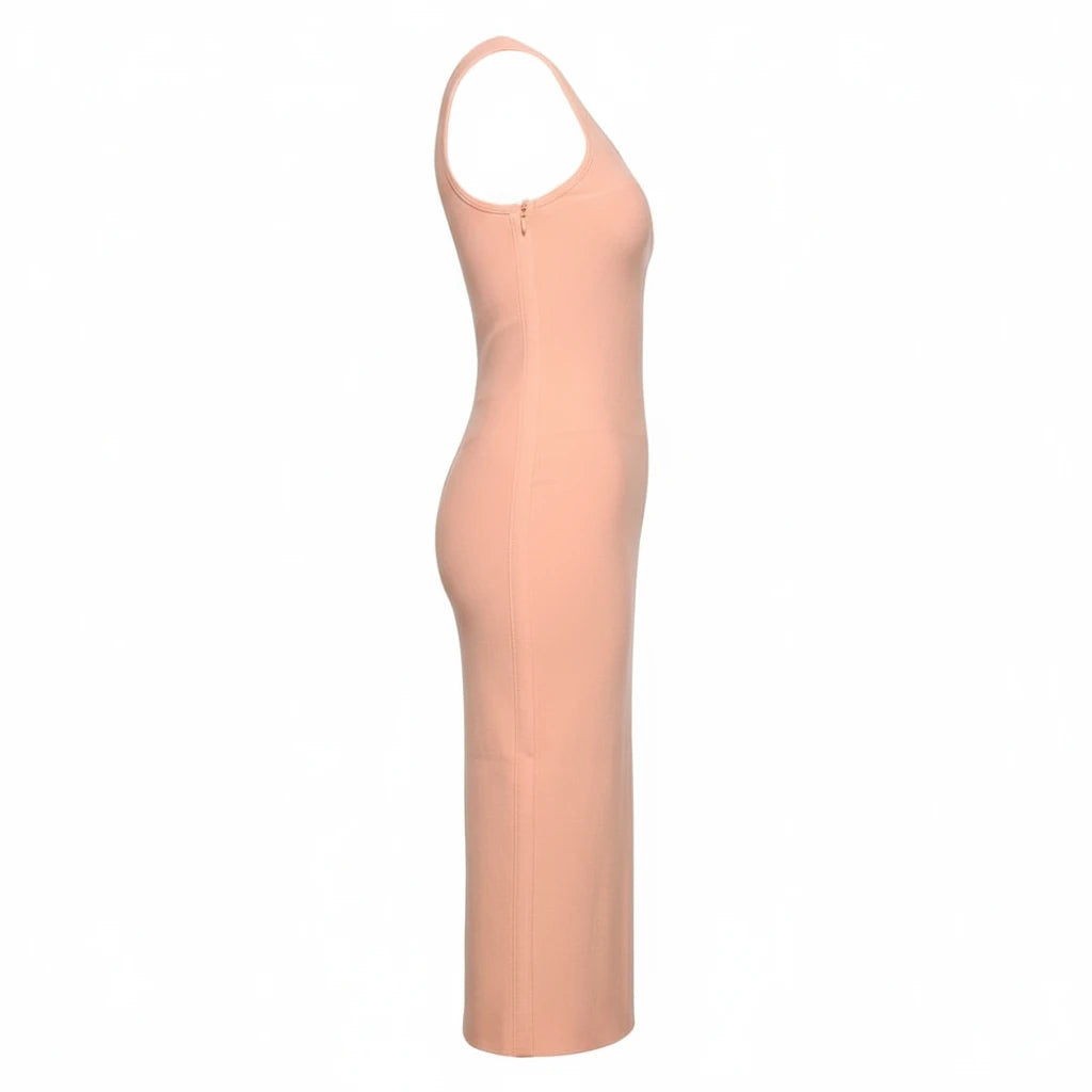 Peach-colored halter neck dress on a gray background