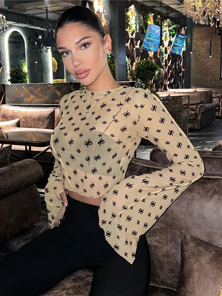 A&A Print Sheer Flared Long Sleeve Round Neck Crop Top
