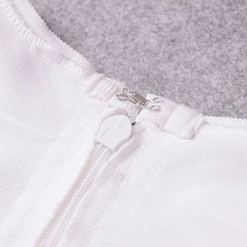 Collage of white fabric on a gray background