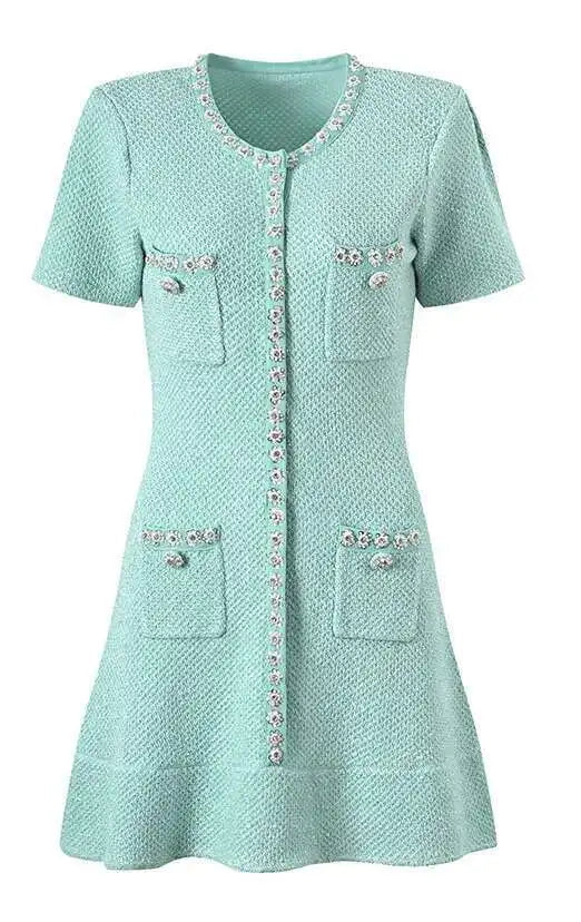 Light blue dress with short sleeves and buttons on a white background