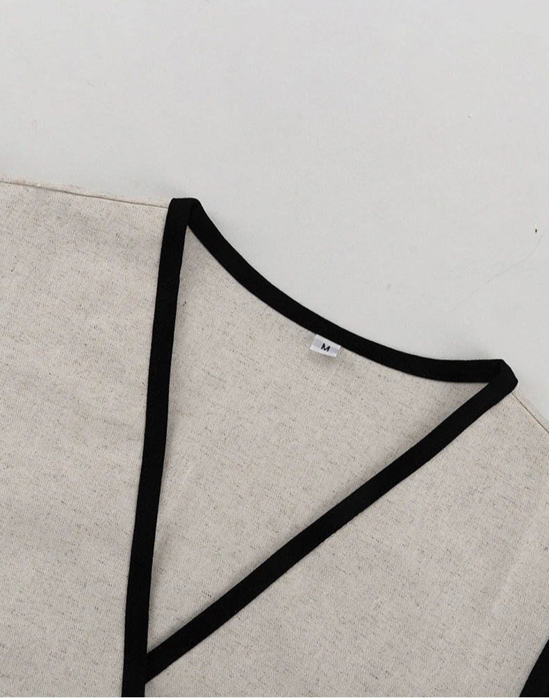 Gray fabric with black geometric pattern on a white background