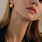 A&A Gold Plated Metal Half Moon Hoop Earrings